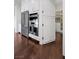 Kitchen features stainless steel appliances and white cabinets at 6700 Regency Stone Way, Las Vegas, NV 89148