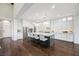 Bright kitchen with stylish island, stainless steel appliances, and sleek white cabinetry at 6700 Regency Stone Way, Las Vegas, NV 89148