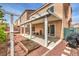 Spacious backyard with a covered patio, perfect for outdoor activities and relaxation at 6843 Philharmonic Ave, Las Vegas, NV 89139