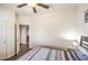 Bedroom showcasing the closet doors and the doorway leading to another room at 6843 Philharmonic Ave, Las Vegas, NV 89139
