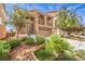 Charming home with a tile roof, balcony, two car garage and landscaped front yard at 6843 Philharmonic Ave, Las Vegas, NV 89139