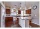 Modern kitchen with stainless steel appliances, granite countertops, and a center island with bar stools at 6843 Philharmonic Ave, Las Vegas, NV 89139