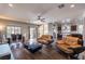 Inviting living room showcases seamless flow, hardwood floors, and an open connection to the kitchen at 6843 Philharmonic Ave, Las Vegas, NV 89139