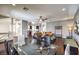 Spacious living room featuring an open floor plan and hardwood floors throughout the living space at 6843 Philharmonic Ave, Las Vegas, NV 89139