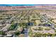 Expansive aerial view showcasing a well-planned community with mature trees, lush landscaping and resort style amenities at 7151 S Durango Dr # 312, Las Vegas, NV 89113