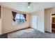 Comfortable bedroom offering natural light and carpet flooring at 7151 S Durango Dr # 312, Las Vegas, NV 89113