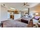 Open living room and kitchen layout with comfortable furnishings at 7151 S Durango Dr # 312, Las Vegas, NV 89113