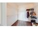 The walk-in closet features brown carpeting and built-in white wire shelving for optimal organization and storage at 7151 S Durango Dr # 312, Las Vegas, NV 89113