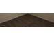 A close up of the carpet and trim in this bedroom at 725 Miller Ave, North Las Vegas, NV 89030