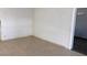 Bright living room featuring tile flooring and neutral paint, perfect for any decor at 725 Miller Ave, North Las Vegas, NV 89030