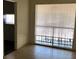 Bright room featuring tile flooring and a large window at 725 Miller Ave, North Las Vegas, NV 89030