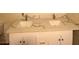 White double sink bathroom vanity with quartz countertops at 7664 Angel Crest Cir, Las Vegas, NV 89117