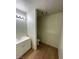 Cozy bathroom featuring a single sink vanity and a separate toilet area at 7664 Angel Crest Cir, Las Vegas, NV 89117