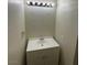 Small bathroom with single sink vanity and bright lighting at 7664 Angel Crest Cir, Las Vegas, NV 89117