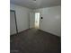 Bright bedroom with neutral walls, carpet, and ample closet space at 7664 Angel Crest Cir, Las Vegas, NV 89117