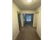 Hallway with carpet and view of the backyard at 7664 Angel Crest Cir, Las Vegas, NV 89117