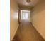 Hallway leading to the living room with a sliding glass door at 7664 Angel Crest Cir, Las Vegas, NV 89117