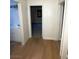 Hallway with bathroom view and hardwood floors at 7664 Angel Crest Cir, Las Vegas, NV 89117