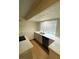 Bright kitchen featuring granite countertops, modern appliances, and ample cabinet space at 7664 Angel Crest Cir, Las Vegas, NV 89117