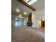Bright living room featuring high ceilings, wooden accents, and fireplace at 7664 Angel Crest Cir, Las Vegas, NV 89117