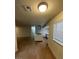 Open floor plan showcasing kitchen, dining area, and hardwood floors at 7664 Angel Crest Cir, Las Vegas, NV 89117