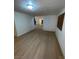 Bright living room with sleek floors and a shuttered window at 7664 Angel Crest Cir, Las Vegas, NV 89117