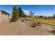Scenic backyard view overlooking the manicured landscaping of the golf course at 7824 Pine Warbler Way, North Las Vegas, NV 89084