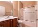 Bathroom featuring a shower-tub combo and modern sink with storage offering functionality at 7824 Pine Warbler Way, North Las Vegas, NV 89084