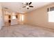 Open floor plan connecting living room and kitchen, perfect for modern living and entertaining at 7824 Pine Warbler Way, North Las Vegas, NV 89084