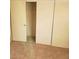 Bedroom closet with beige carpeting and closet doors at 7990 Firethorn, Las Vegas, NV 89123