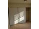 Bedroom closet with shelf and light streaming through blinds at 7990 Firethorn, Las Vegas, NV 89123