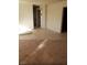 Spacious living room with tile and carpet flooring and neutral wall color at 7990 Firethorn, Las Vegas, NV 89123