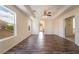 Hardwood floors, and natural light highlight this generously sized bedroom at 824 Bussora Rose Dr, Henderson, NV 89015