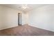 Neutral bedroom with carpeted floors and open doors at 824 Bussora Rose Dr, Henderson, NV 89015
