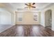 Bright, spacious bedroom with hardwood floors and large windows at 824 Bussora Rose Dr, Henderson, NV 89015
