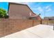Home exterior with a brick wall at 824 Bussora Rose Dr, Henderson, NV 89015