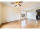 Bright room featuring wood floors, chandelier, and large windows at 824 Bussora Rose Dr, Henderson, NV 89015