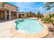 Sparkling pool surrounded by desert landscaping at 824 Bussora Rose Dr, Henderson, NV 89015
