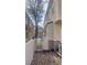 Fenced backyard with gravel landscape and patio at 8664 Traveling Breeze Ave # 102, Las Vegas, NV 89178