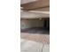 Spacious garage with a brick-paved driveway and ample space for parking at 8664 Traveling Breeze Ave # 102, Las Vegas, NV 89178