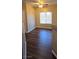 Bedroom with wood laminate flooring, neutral walls, baseboard trim and natural light at 9000 Las Vegas Blvd # 1015, Las Vegas, NV 89123