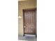 Entry door featuring a secure electronic lock system on a well-maintained complex with unit number 1015 at 9000 Las Vegas Blvd # 1015, Las Vegas, NV 89123