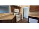 Kitchen featuring granite countertops, gas burning range, white appliances, and dark cabinetry at 9000 Las Vegas Blvd # 1015, Las Vegas, NV 89123