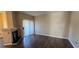 Living room featuring a black fireplace, sliding glass doors to the outdoor, and wood laminate flooring at 9000 Las Vegas Blvd # 1015, Las Vegas, NV 89123