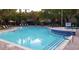 Sparkling community pool with lounge chairs and lush landscaping at 9000 Las Vegas Blvd # 1015, Las Vegas, NV 89123