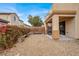 Inviting backyard with a covered patio, perfect for outdoor entertaining at 9049 Teetering Rock Ave, Las Vegas, NV 89143