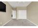 Comfortable bedroom featuring a ceiling fan, closet, and television hookup for added convenience and entertainment at 9049 Teetering Rock Ave, Las Vegas, NV 89143