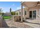 Scenic backyard with a hot tub and covered patio, perfect for relaxation and outdoor entertainment at 9211 Golden Feather Ct, Las Vegas, NV 89147