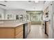 Bright, open kitchen with ample counter space and a bay window overlooking the backyard at 9211 Golden Feather Ct, Las Vegas, NV 89147
