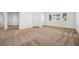 Bright and airy living room with neutral carpet and ample natural light at 9211 Golden Feather Ct, Las Vegas, NV 89147